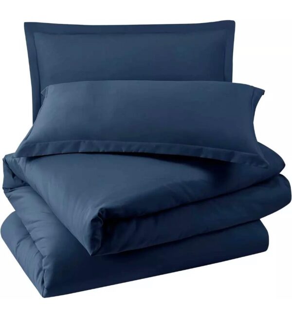 navy blue pillowcases and bedsheet