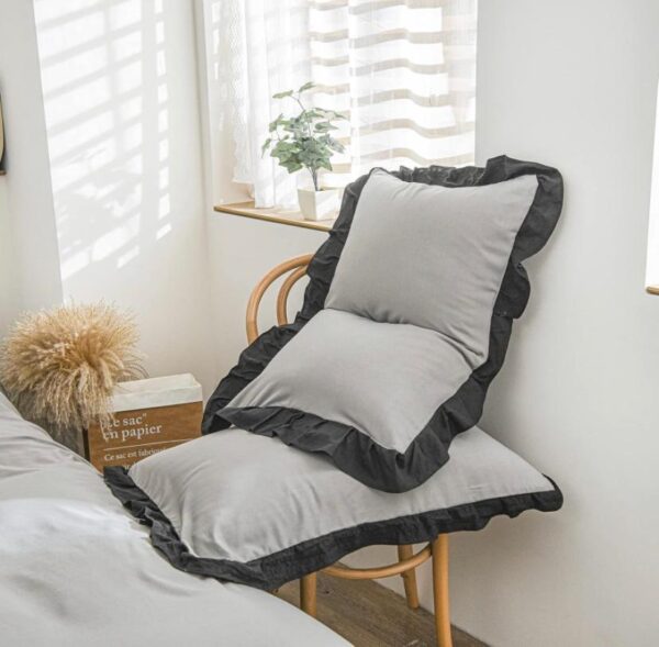 grey and black ruffled pillowcases