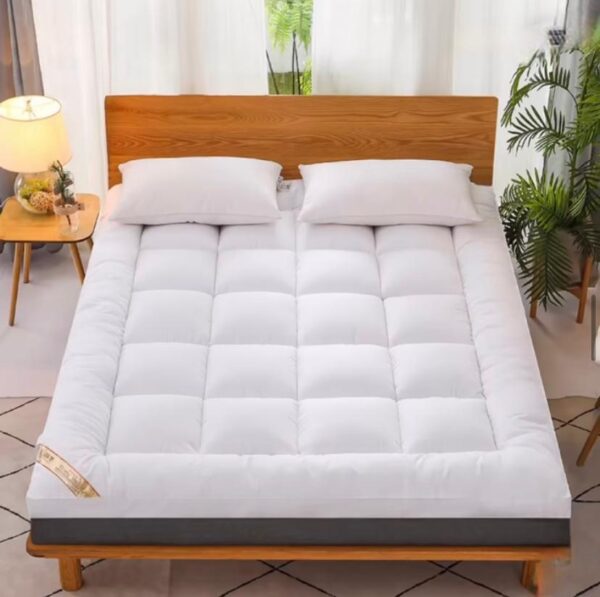 White mattress topper