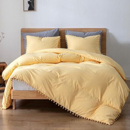 yellow pom pom duvet set