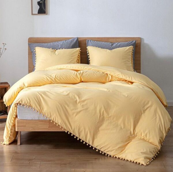 yellow pom pom duvet set