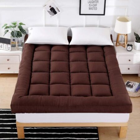 Brown mattress topper