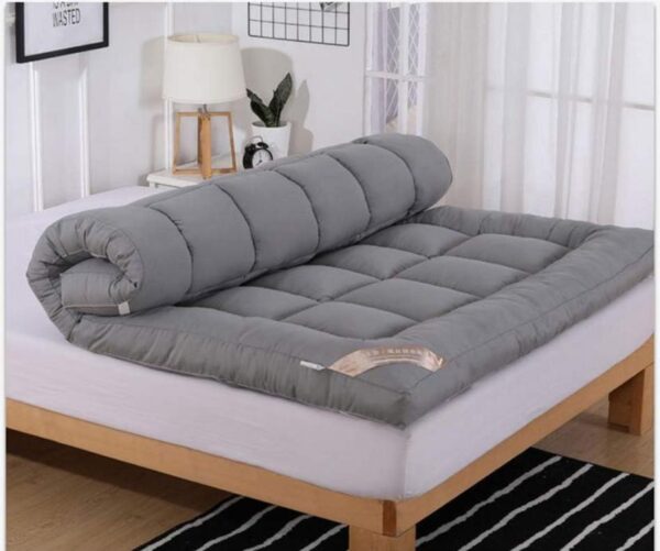 Grey mattress topper