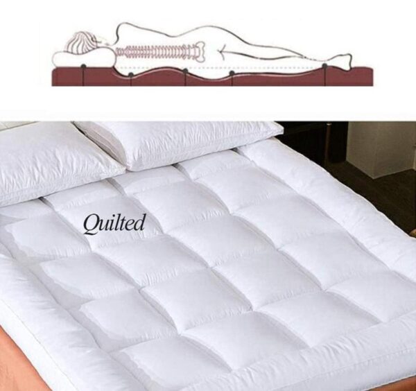 White quilted mattress topper