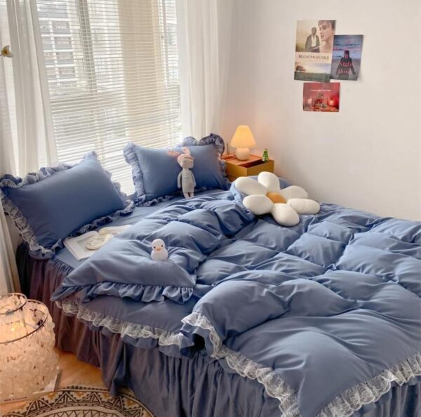 blue ruffle duvet with bedsheet and pillowcases