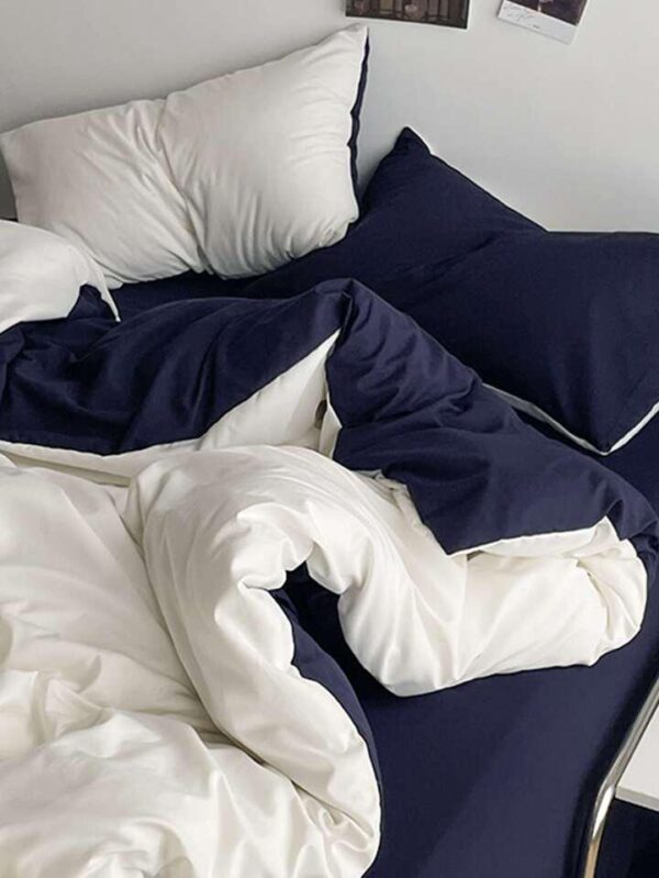 white and navy blue duvet