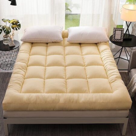 Yellow mattress topper