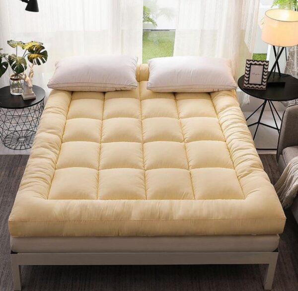 Yellow mattress topper