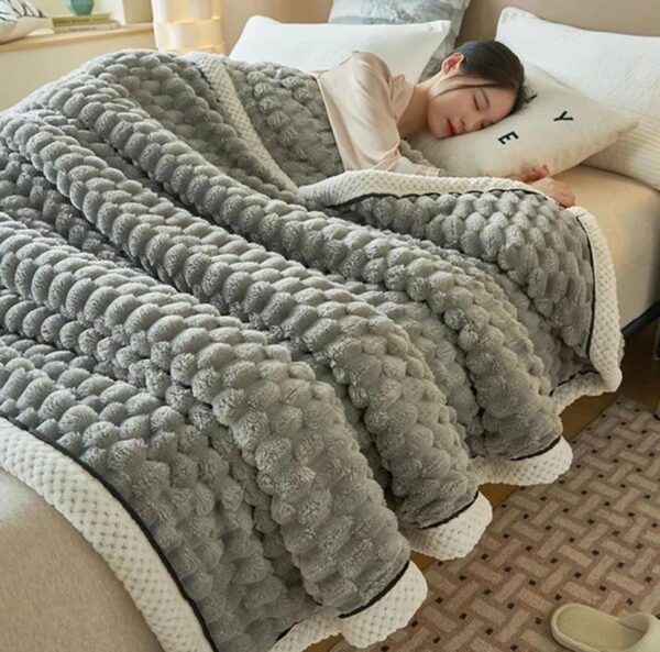 light grey sleeping blanket