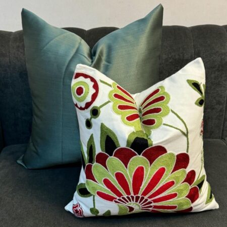 red floral throw pillow