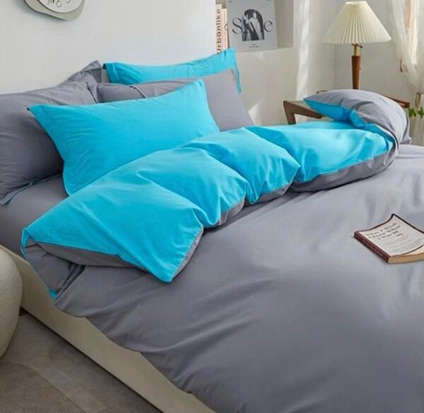 blue and grey reversible quilted duvet set