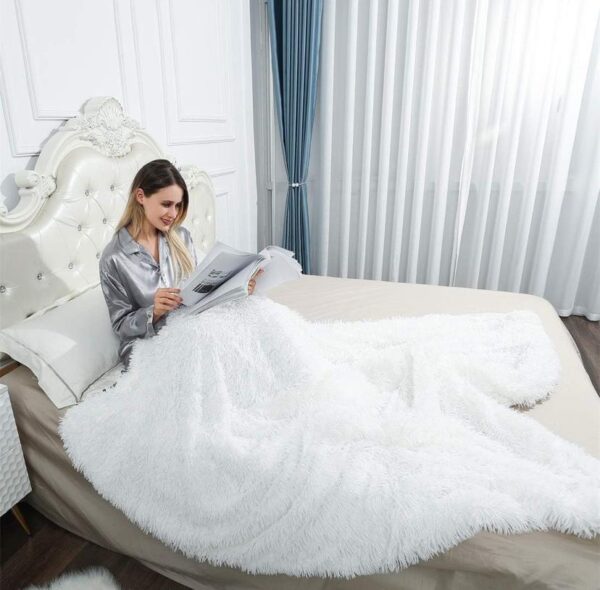 white faux fur bed blanket