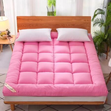 Pink mattress topper