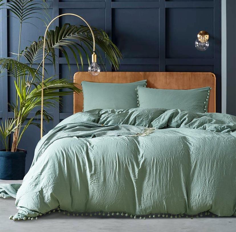 green pom pom bedding set