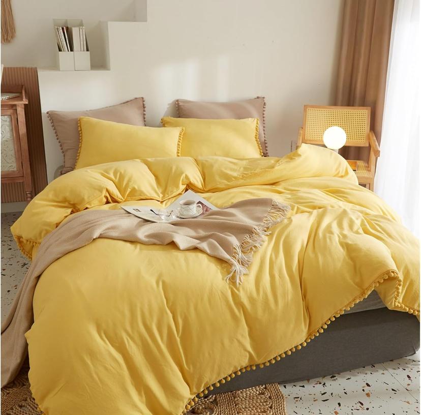 yellow pom pom duvet set