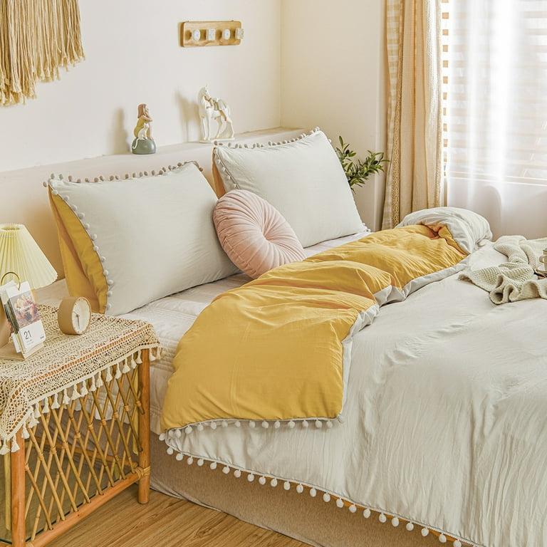 white pom pom bedding set